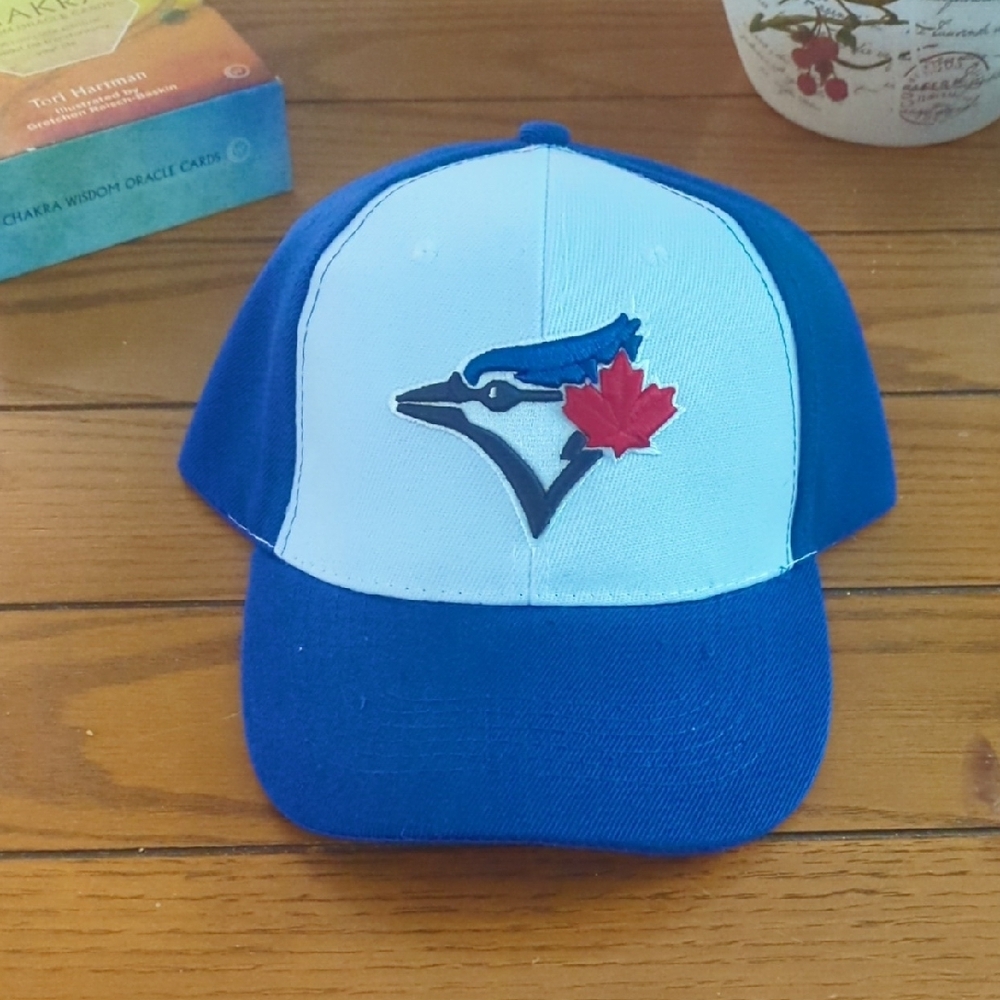 Blue and White Cap with Bird and Leaf Logo